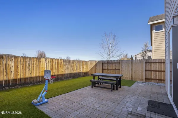 a view of a backyard with a slide