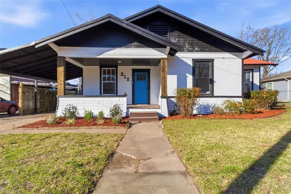 a front view of a house with patio