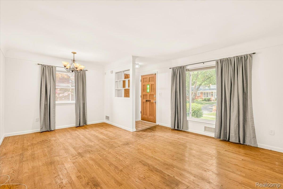 11802 Columbia Street Redford, MI 48239 - Photo 2 of 39 Original Hardwood Floors in good condition. Vinyl Replacement Windows throughout with great Natural Light.