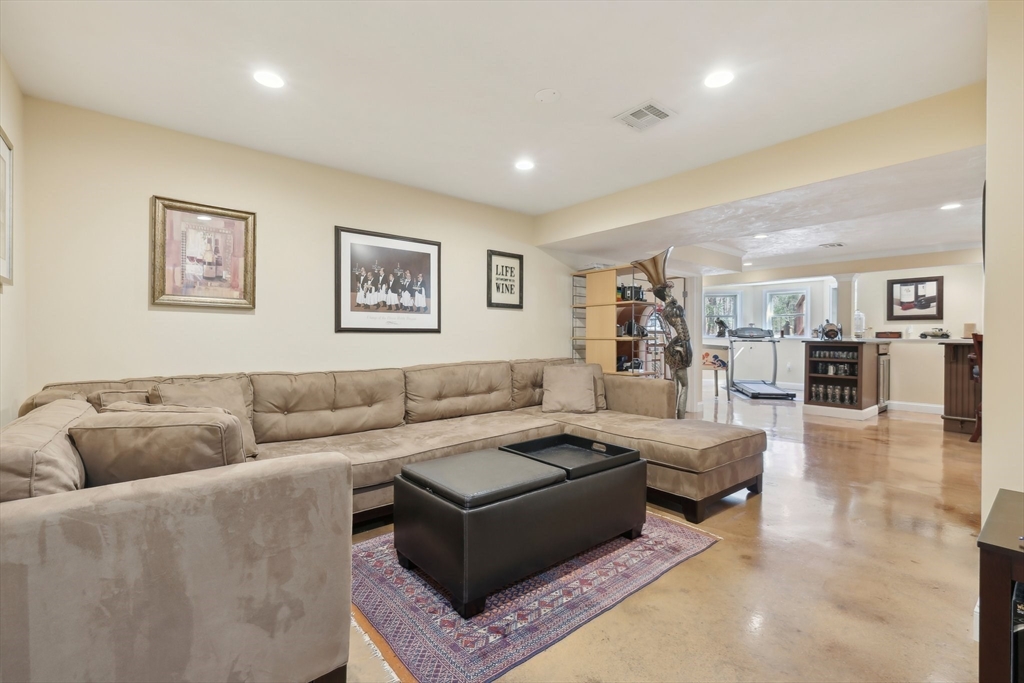 211 Red Acre Road Stow, MA 01775 - Photo 23 of 35 a living room with furniture and view of kitchen