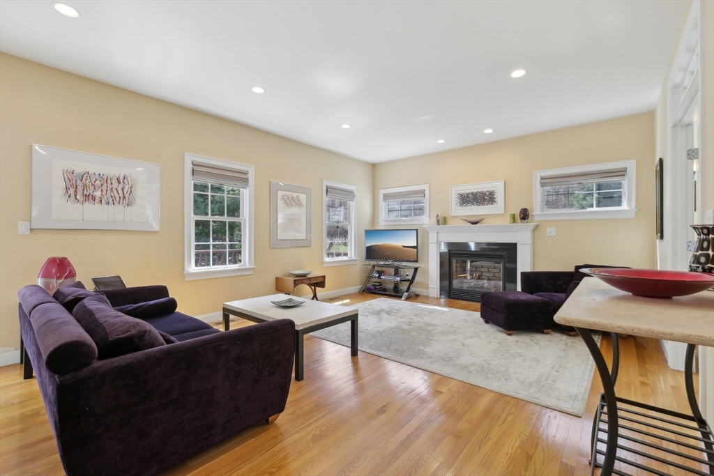 211 Red Acre Road Stow, MA 01775 - Photo 8 of 35 a living room with furniture and a flat screen tv