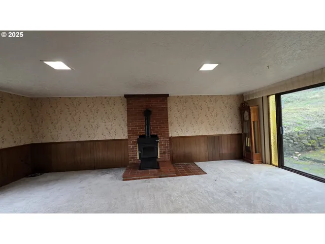 an empty room with closet area