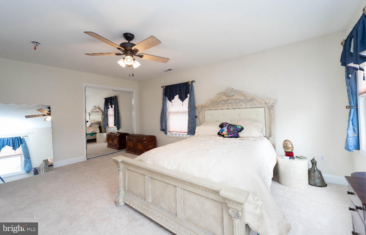 4 Helena Avenue Baltimore, MD 21221 - Photo 11 of 25 Spacious bedroom with elegant decor.