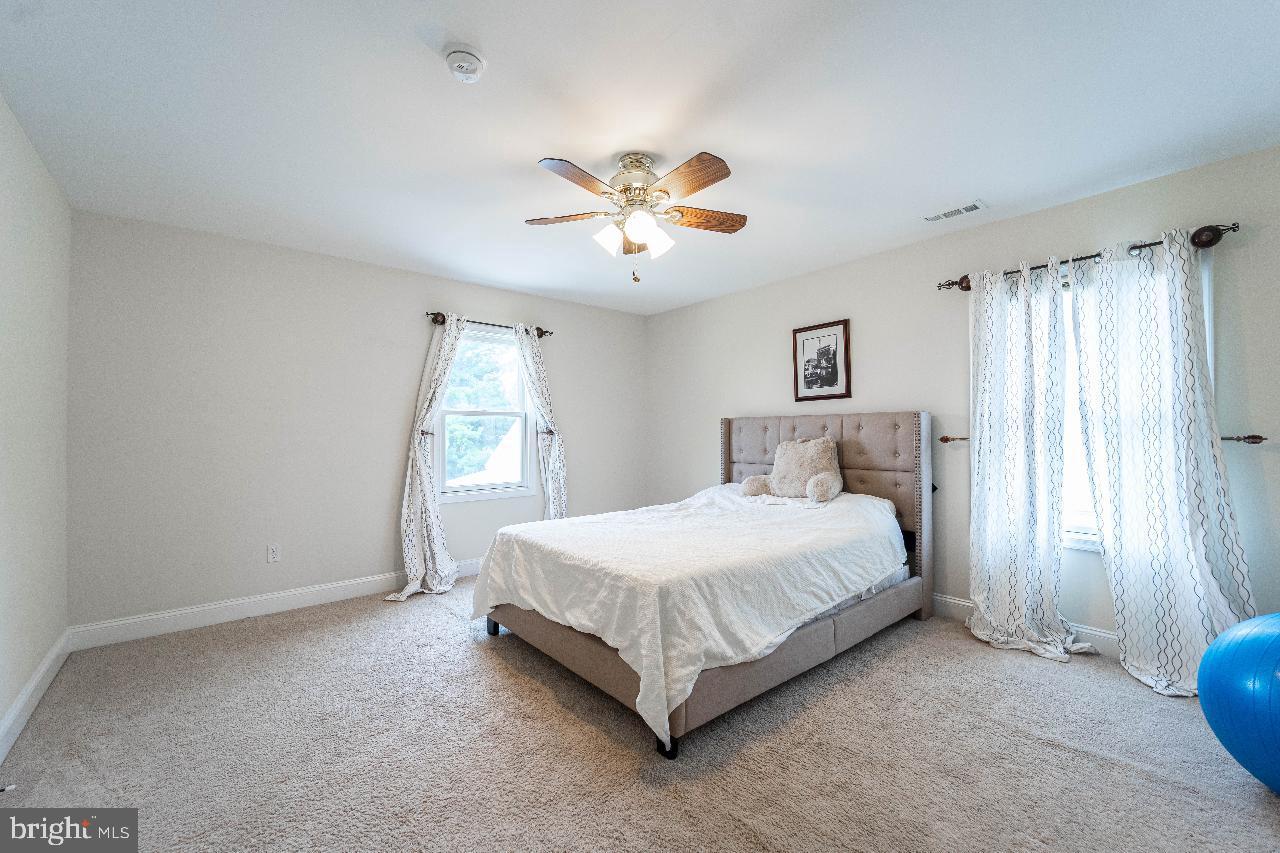 4 Helena Avenue Baltimore, MD 21221 - Photo 10 of 25 Bright and airy bedroom with cozy charm.