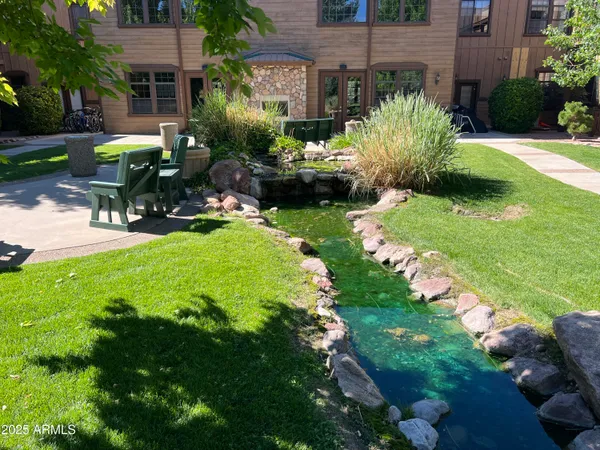 a garden view with a seating space