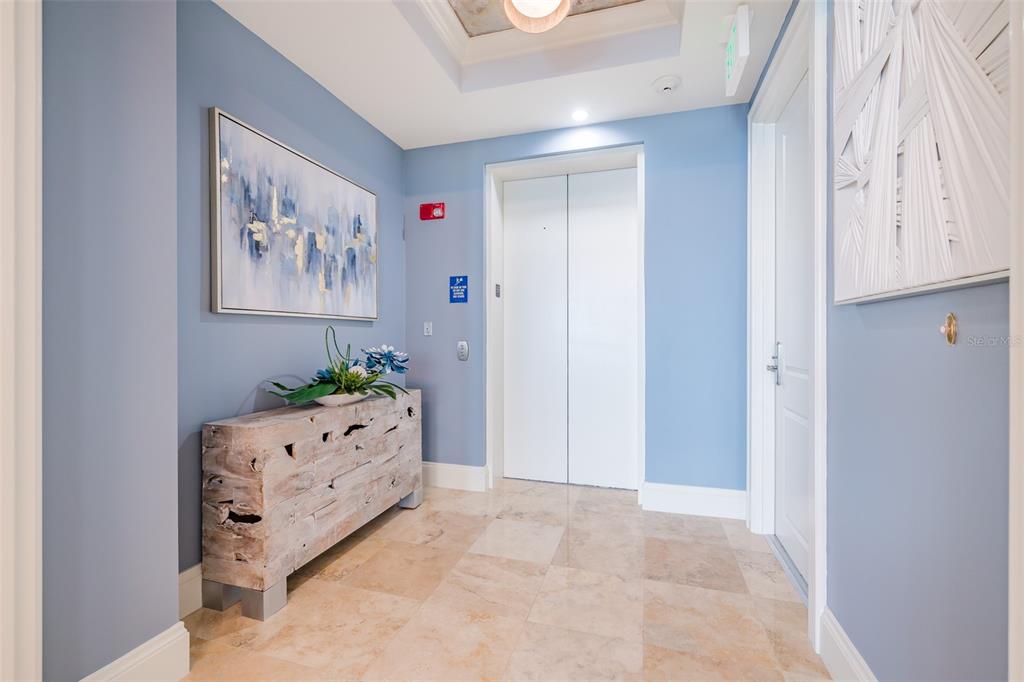 130 Riviera Dunes Way, Unit 802 Palmetto, FL 34221 - Photo 2 of 56 a room with painting and lamp