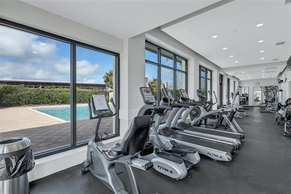 130 Riviera Dunes Way, Unit 802 Palmetto, FL 34221 - Photo 40 of 56 a view of a room with gym equipment
