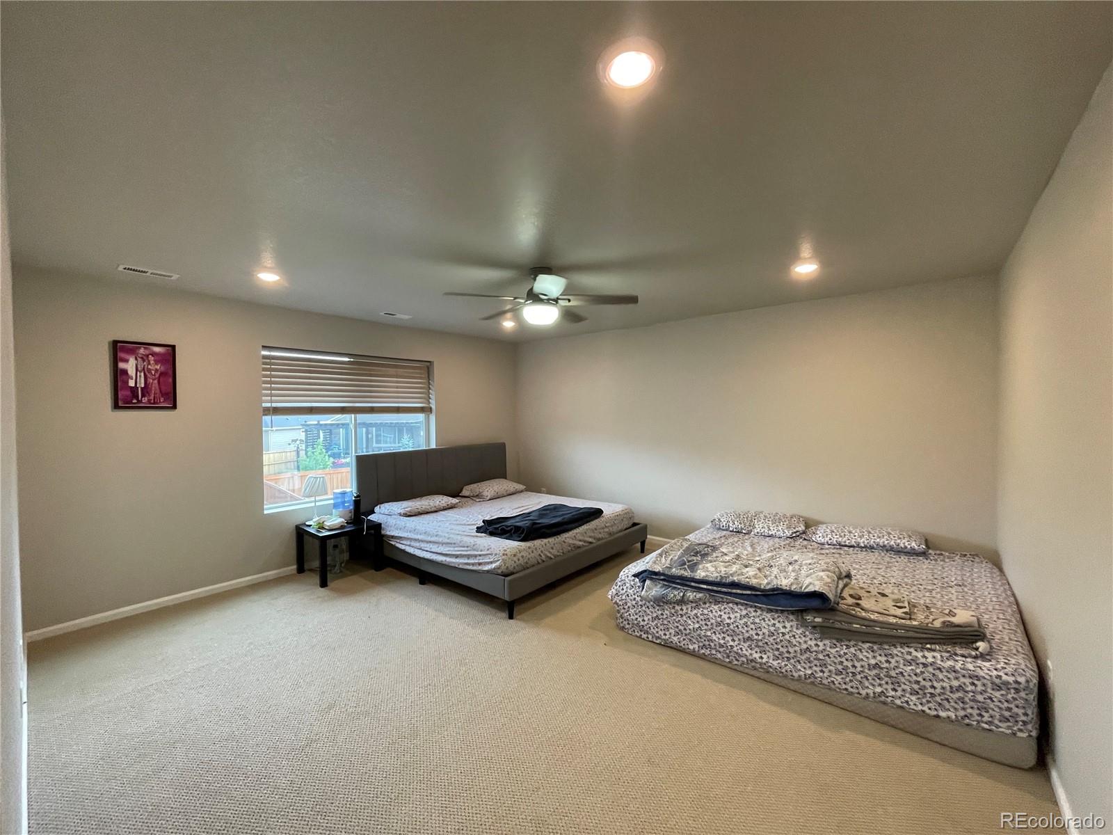 17342 Springfield Drive Parker, CO 80134 - Photo 13 of 35 a living room with furniture and a table