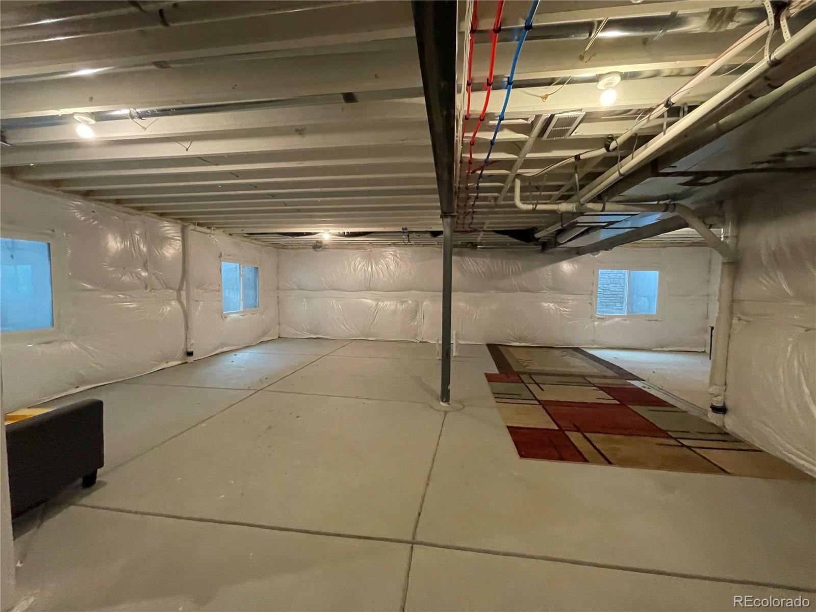17342 Springfield Drive Parker, CO 80134 - Photo 28 of 35 a view of a room with wooden walls