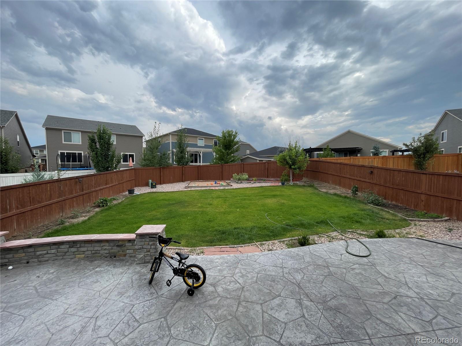 17342 Springfield Drive Parker, CO 80134 - Photo 29 of 35 a view of a chair and table in the garden