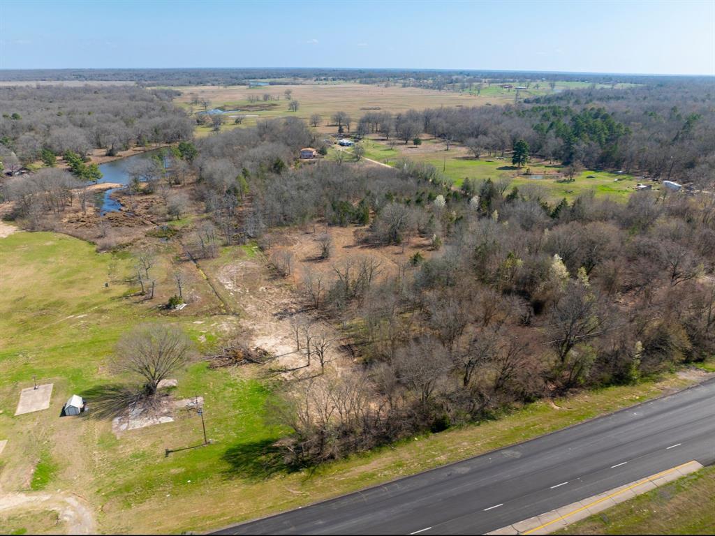 0 Us 271 Arthur City, TX 75411 - Photo 19 of 24 an aerial view of a houses with beach