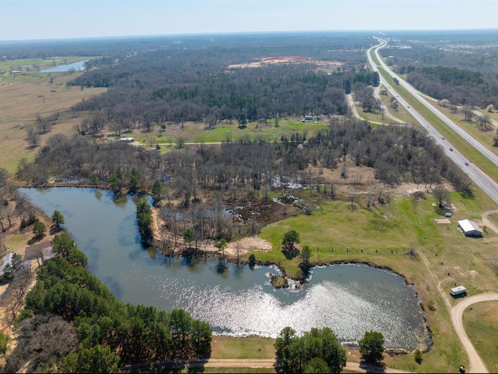 0 Us 271 Arthur City, TX 75411 - Photo 6 of 24 an aerial view of a house with a yard