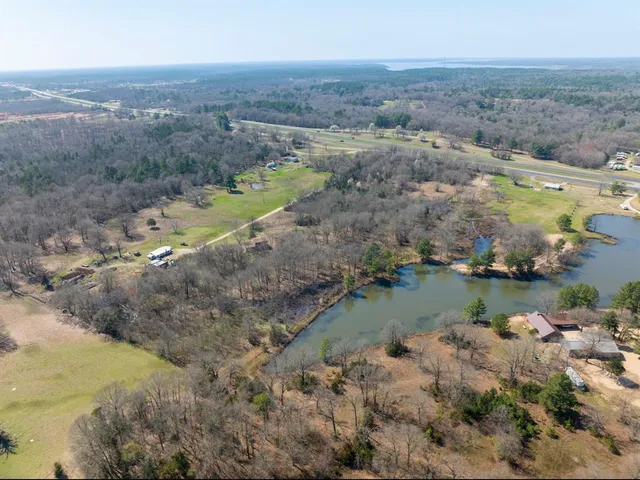 an aerial view of lake residential house with outdoor space