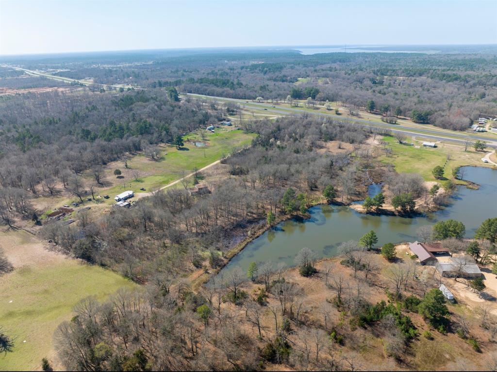 0 Us 271 Arthur City, TX 75411 - Photo 10 of 24 an aerial view of lake residential house with outdoor space