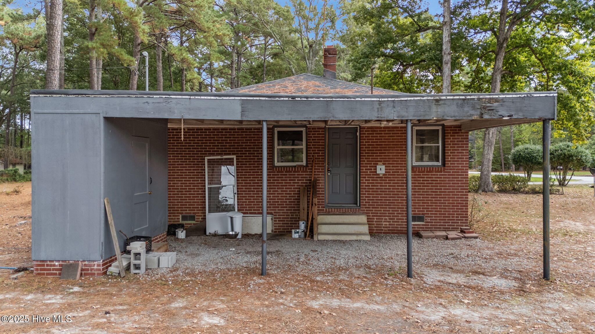 100 Crestview Road Rocky Mount, NC 27801 - Photo 23 of 31 Side Elevation - Carport