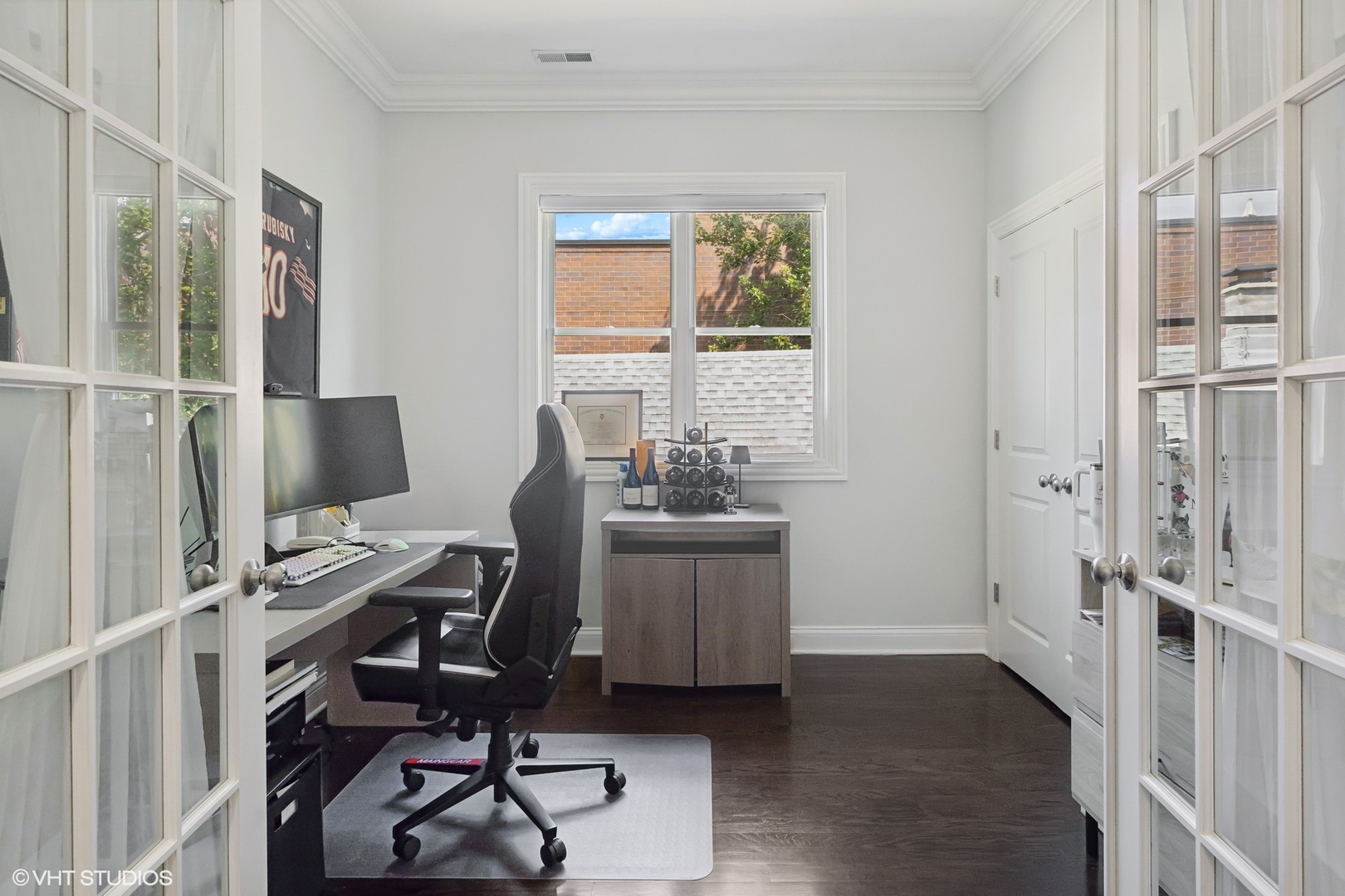 2449 North Racine Avenue, Unit 3 Chicago, IL 60614 - Photo 12 of 18 a view of a workspace with furniture and a window
