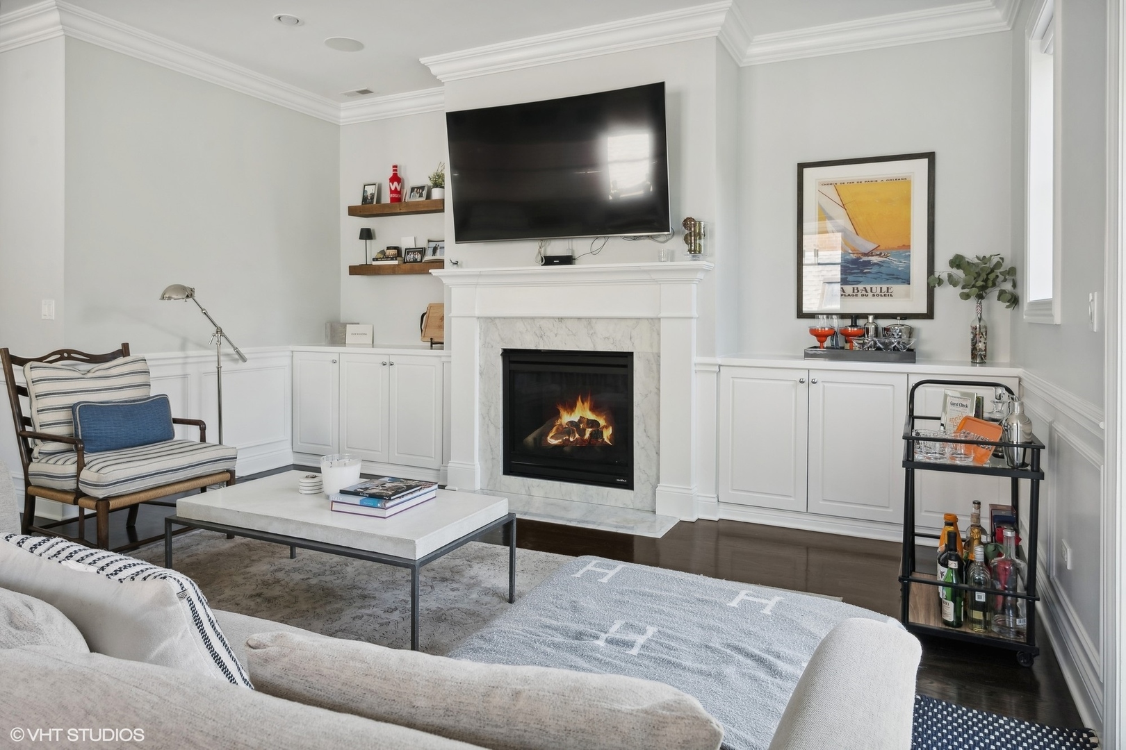 2449 North Racine Avenue, Unit 3 Chicago, IL 60614 - Photo 5 of 18 a living room with furniture a flat screen tv and a fireplace
