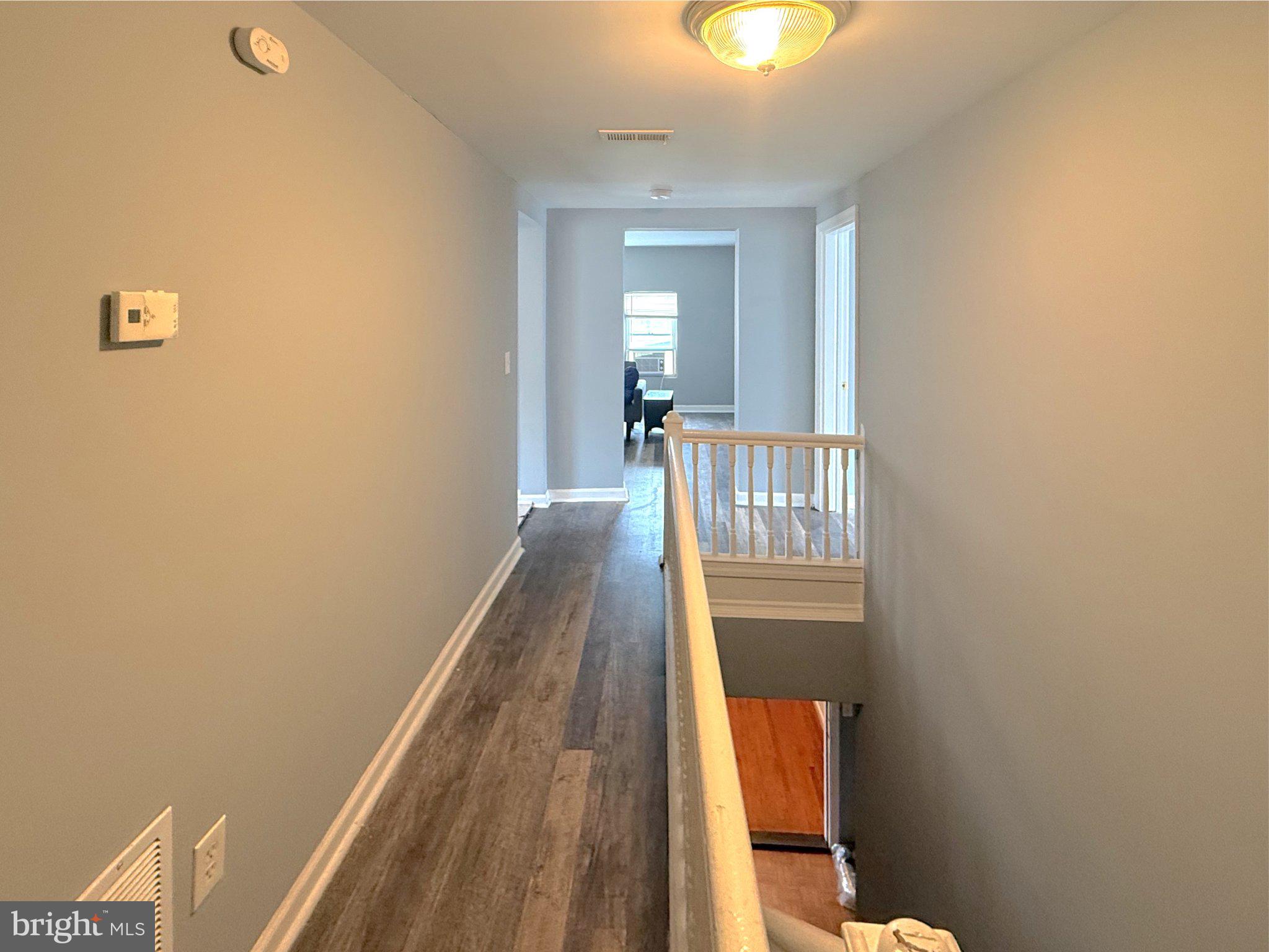 304 Collins Avenue, Unit 2 Baltimore, MD 21229 - Photo 4 of 17 Bright and airy hallway retreat.
