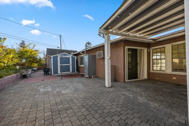 a view of a house with a patio
