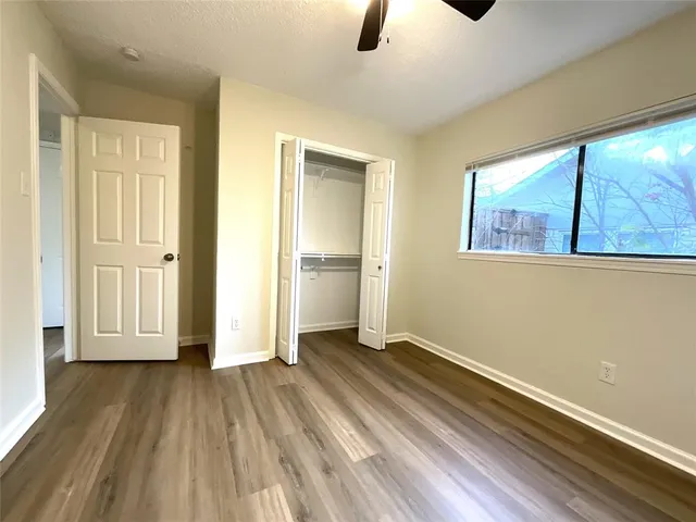 a kitchen with a stove and a microwave