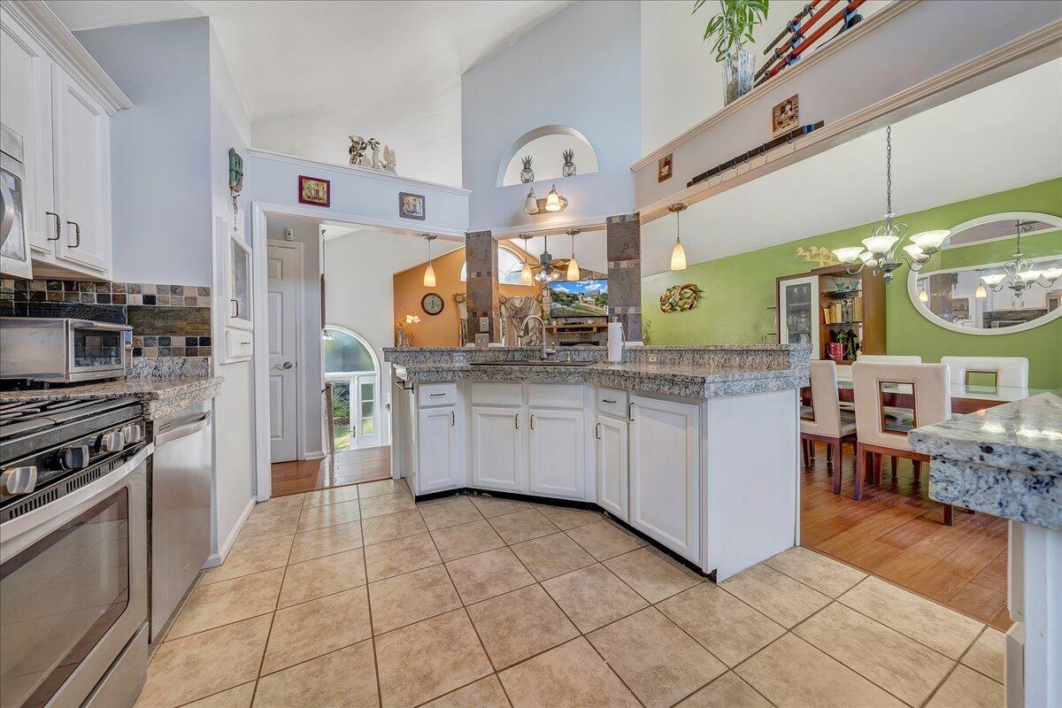 532 Ray Street Roanoke, VA 24019 - Photo 2 of 38 a kitchen with stainless steel appliances a sink and a refrigerator