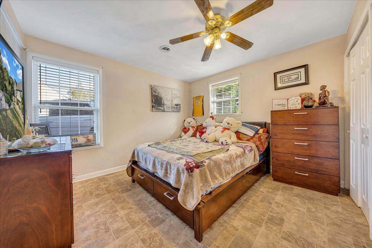 532 Ray Street Roanoke, VA 24019 - Photo 17 of 38 a bed room with a bed and window