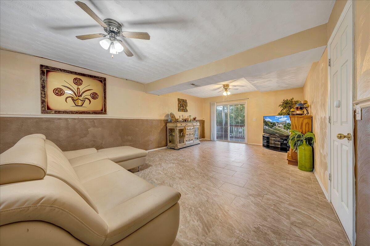 532 Ray Street Roanoke, VA 24019 - Photo 19 of 38 a living room with furniture and a chandelier