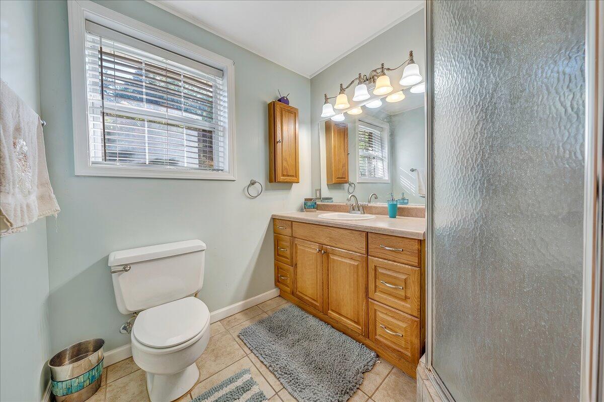 532 Ray Street Roanoke, VA 24019 - Photo 20 of 38 a bathroom with a toilet sink and mirror