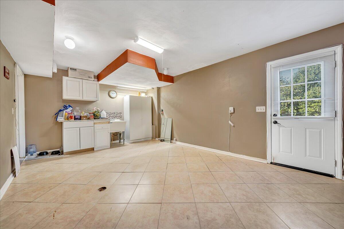 532 Ray Street Roanoke, VA 24019 - Photo 22 of 38 a view of a kitchen with a sink and a refrigerator