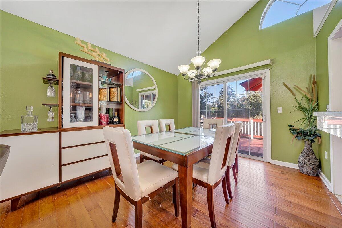 532 Ray Street Roanoke, VA 24019 - Photo 6 of 38 a view of a dining room with furniture a chandelier and wooden floor