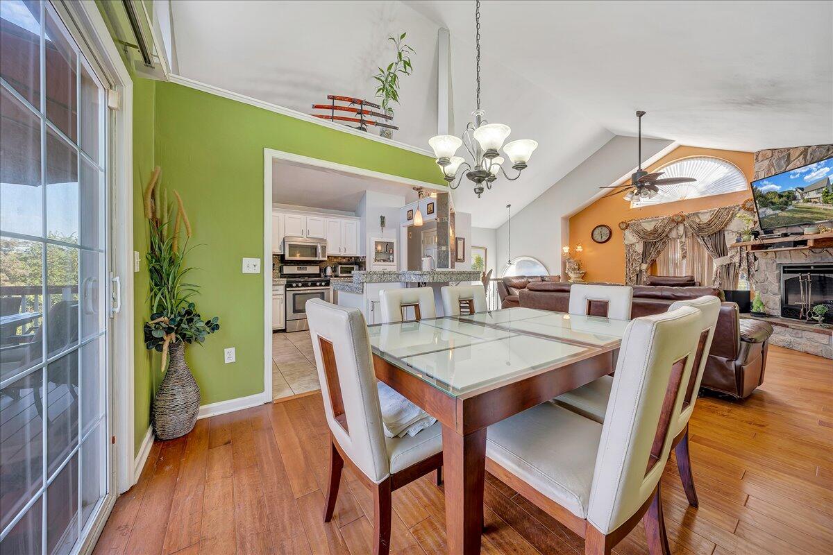 532 Ray Street Roanoke, VA 24019 - Photo 7 of 38 a view of a dining room with furniture and wooden floor