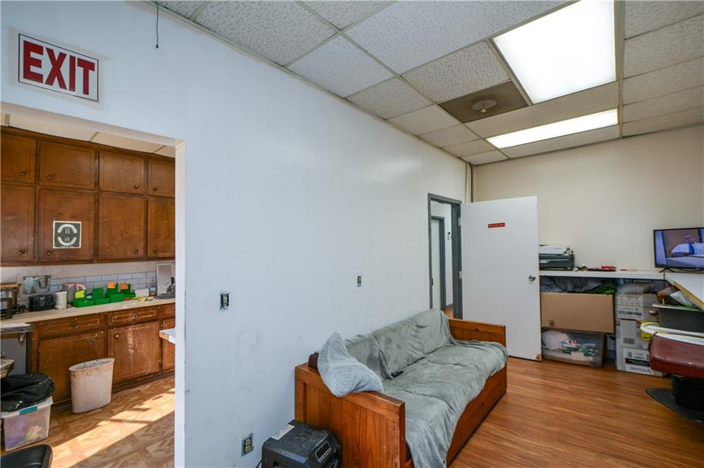 4298 Memorial Drive, Unit D Decatur, GA 30032 - Photo 16 of 26 a living room with furniture and wooden floor