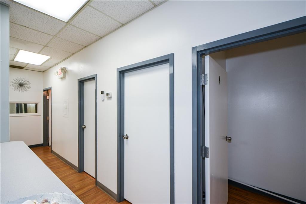 4298 Memorial Drive, Unit D Decatur, GA 30032 - Photo 18 of 26 a view of a hallway with wooden floor and staircase