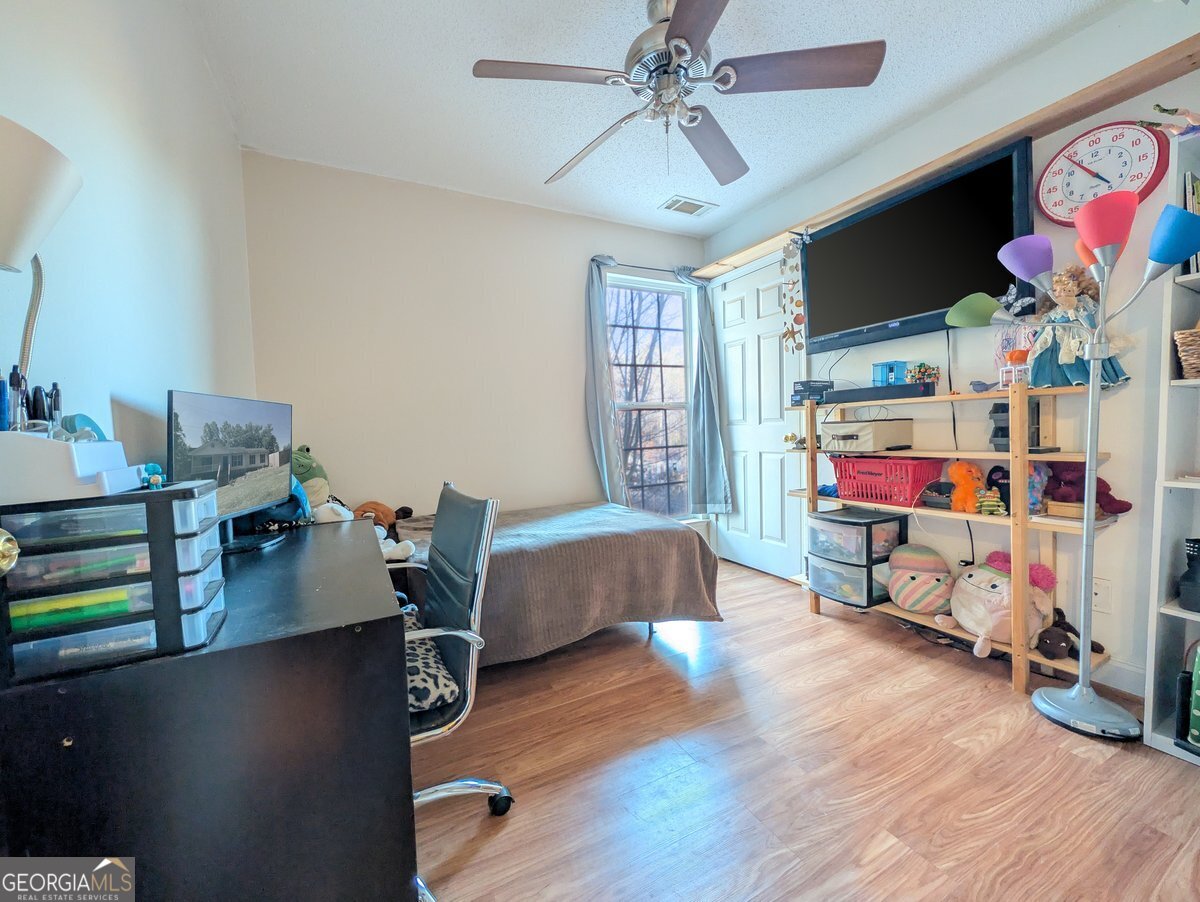 571 Suttles Road Martin, GA 30557 - Photo 4 of 6 a room with furniture and a flat screen tv