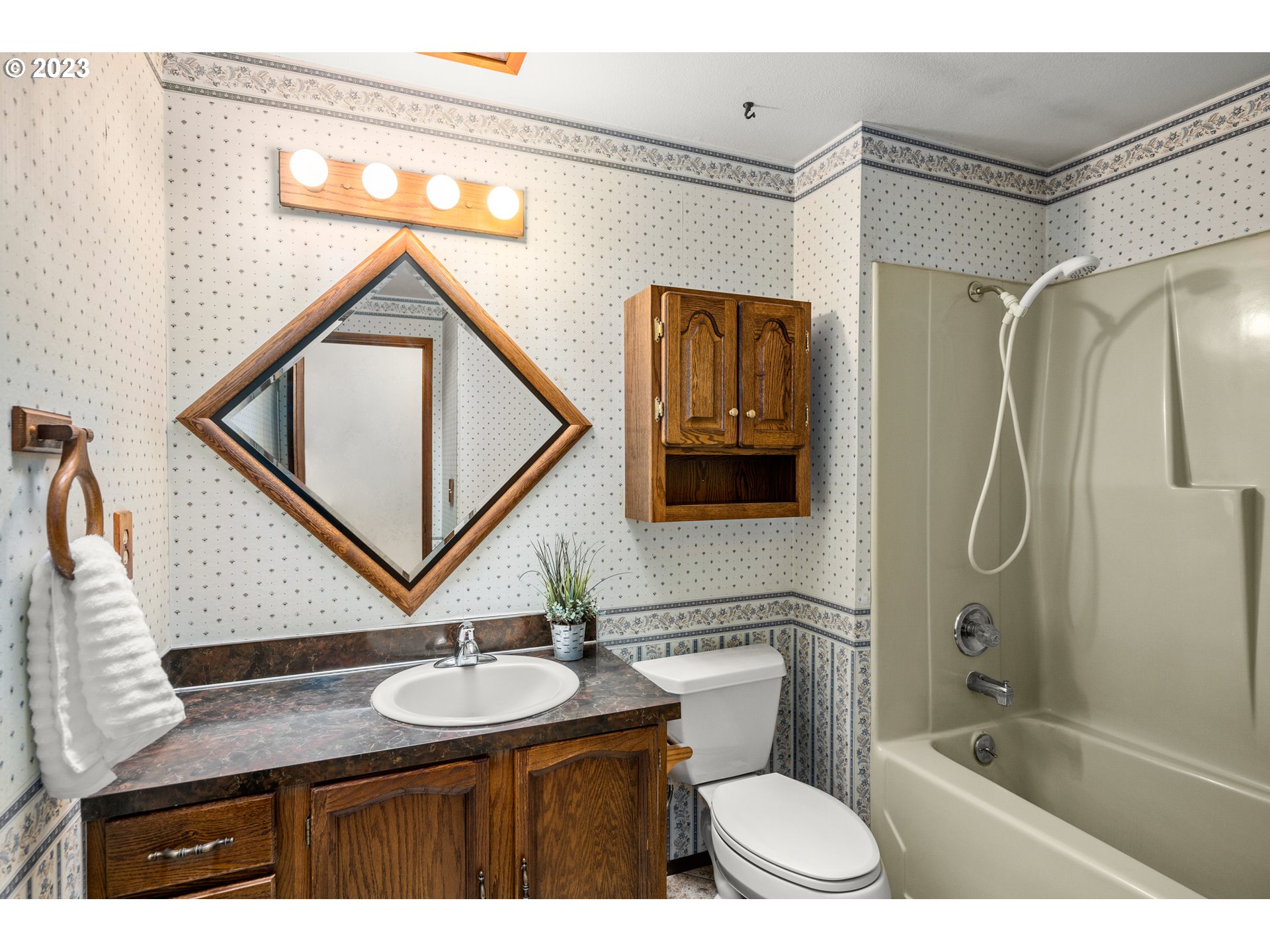 23490 South Beatie Road Oregon City, OR 97045 - Photo 15 of 30 a bathroom with a granite countertop sink toilet and shower