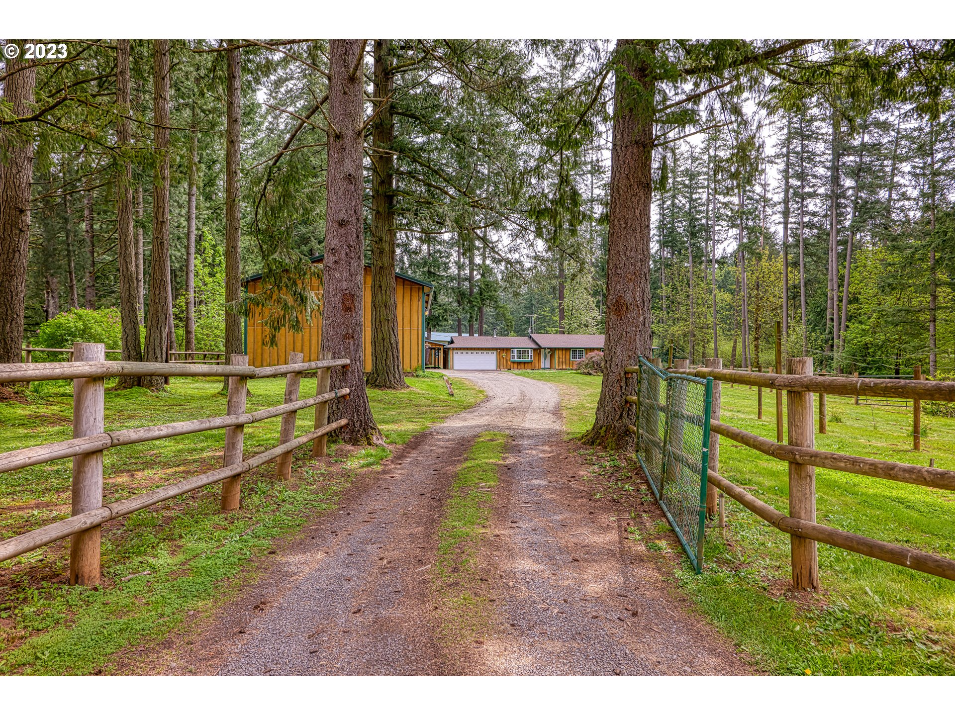 23490 South Beatie Road Oregon City, OR 97045 - Photo 2 of 30 a view of a park with large trees