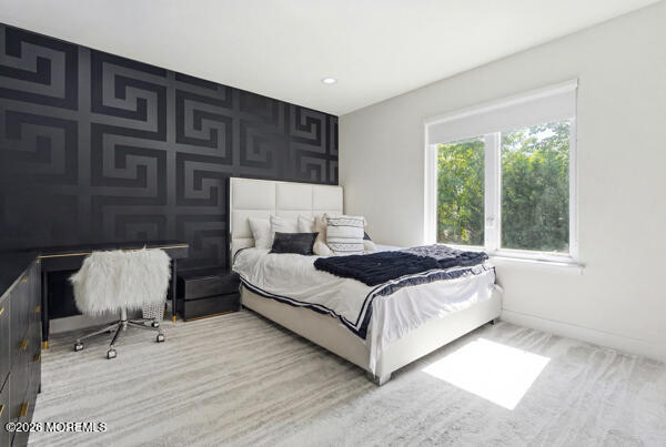 54 Georgetown Road Eatontown, NJ 07724 - Photo 10 of 24 a bedroom with a bed a chair and next to a window