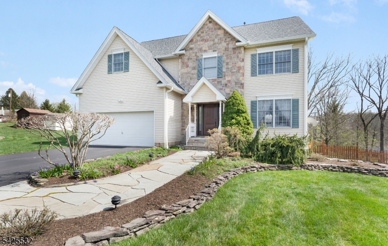 6 Ridge Road Frenchtown, NJ 08825 - Photo 1 of 33 a front view of a house with a garden and plants