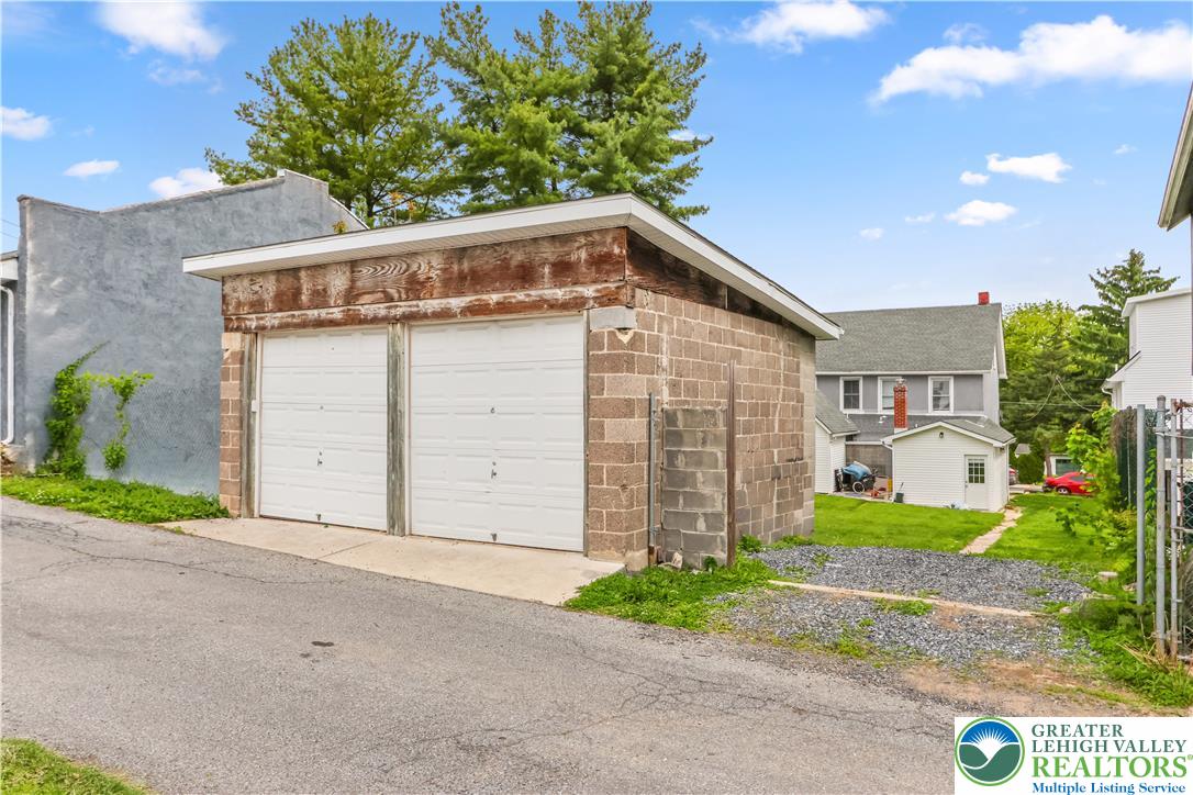 12 South Front Street Coplay, PA 18037 - Photo 36 of 41 This two-car garage provides practical utility and additional storage space.