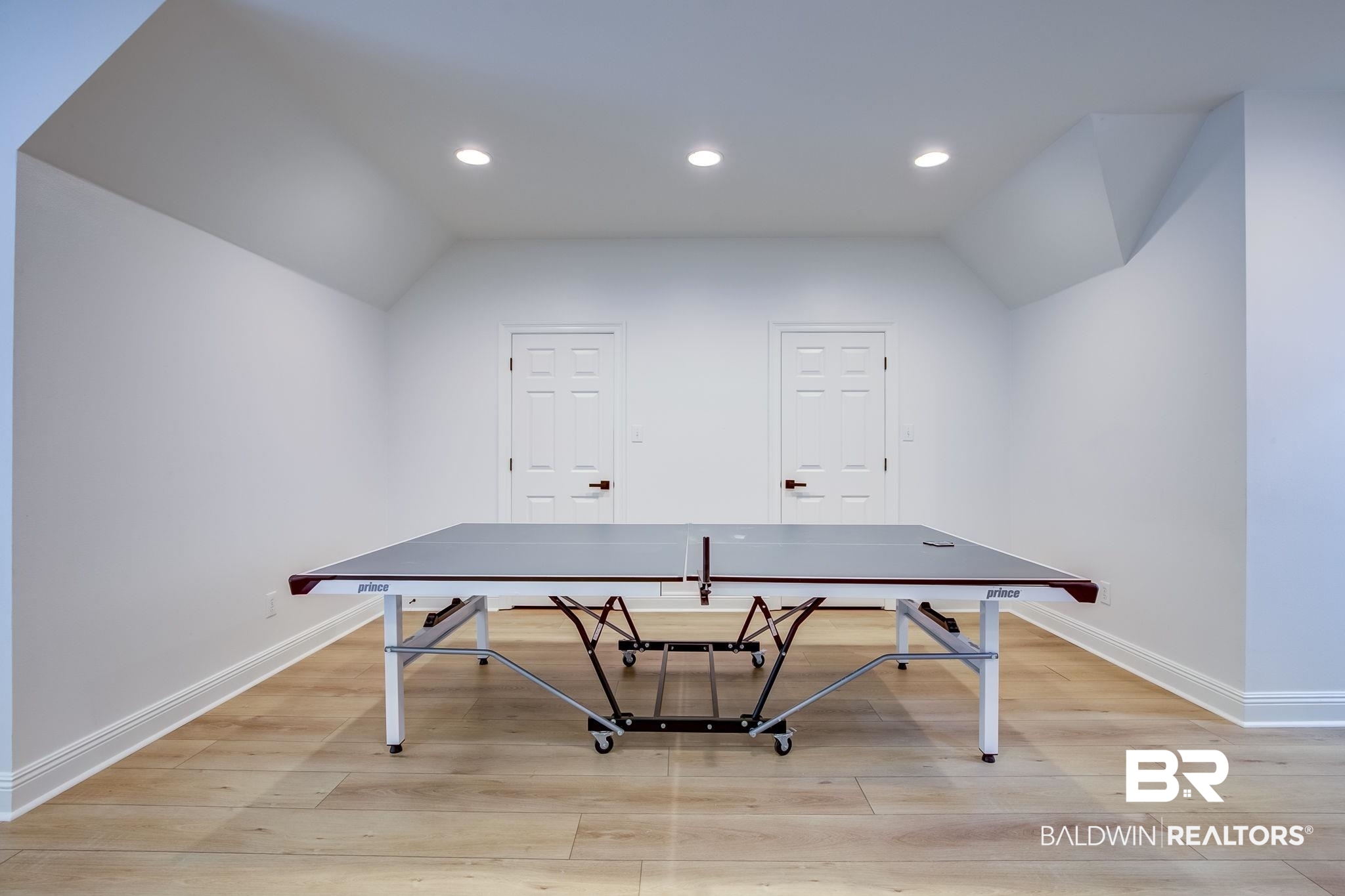 105 High Pines Ridge Fairhope, AL 36532 - Photo 79 of 97 Recreation room featuring lofted ceiling, baseboards, light wood finished floors, and recessed lighting