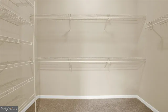 a bathroom with a sink double vanity and a mirror