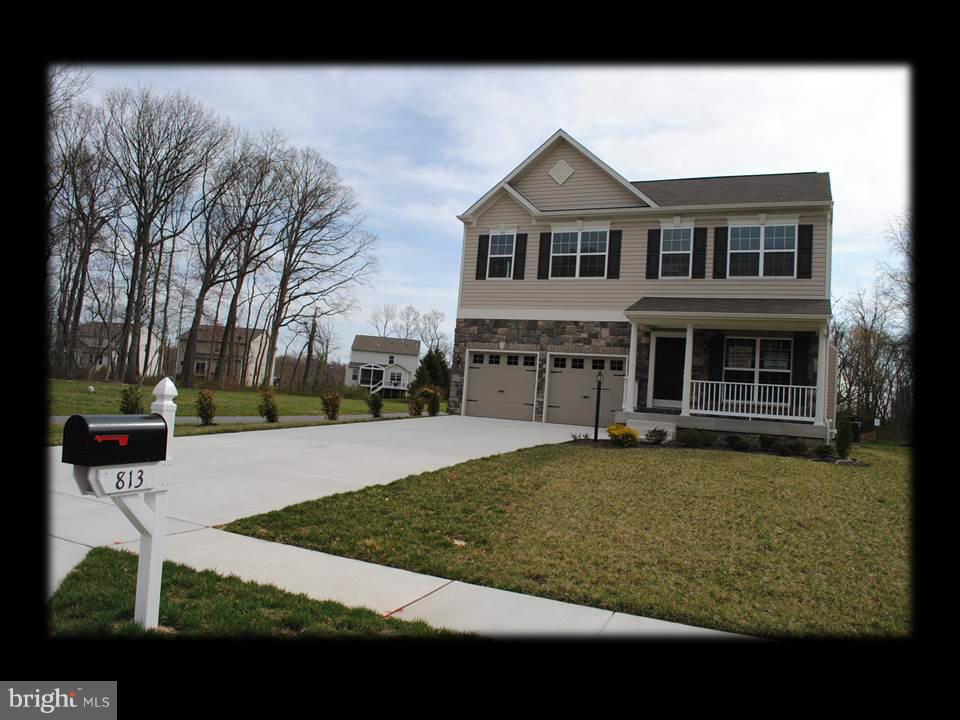813 Wampler Road Baltimore, MD 21220 - Photo 2 of 30 a view of a house with a yard