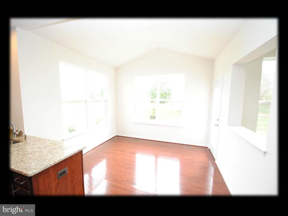 813 Wampler Road Baltimore, MD 21220 - Photo 16 of 30 a view of an empty room and window