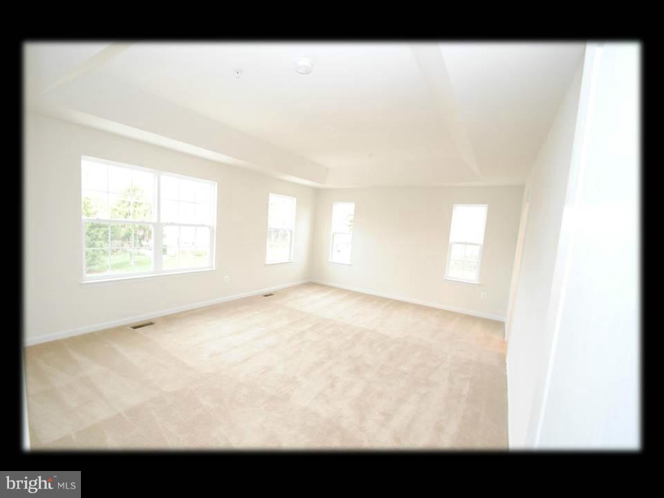 813 Wampler Road Baltimore, MD 21220 - Photo 18 of 30 a view of an empty room with a window