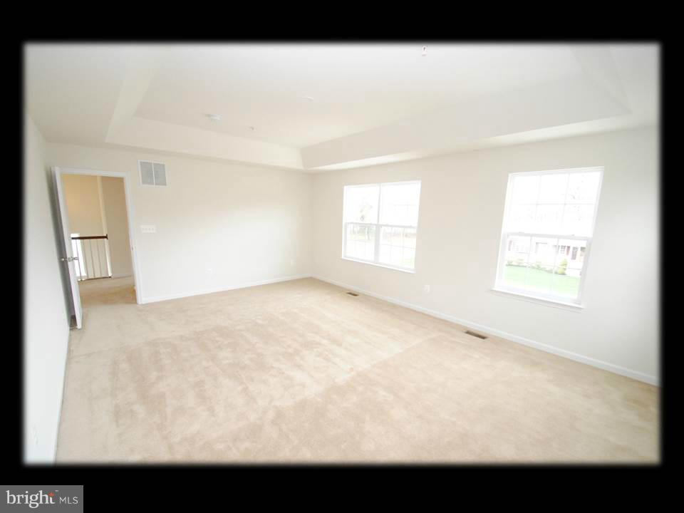 813 Wampler Road Baltimore, MD 21220 - Photo 19 of 30 a view of an empty room with a window