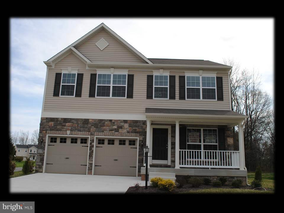 813 Wampler Road Baltimore, MD 21220 - Photo 3 of 30 a front view of a house with a yard