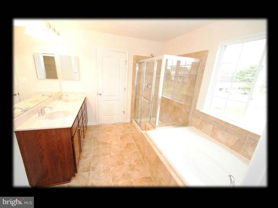 813 Wampler Road Baltimore, MD 21220 - Photo 22 of 30 a view of a living room with a large window