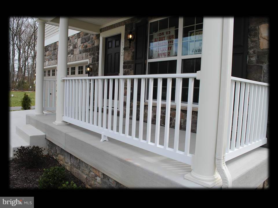 813 Wampler Road Baltimore, MD 21220 - Photo 8 of 30 a view of a brick house with a porch