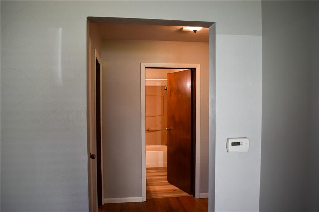 1149 Highland Avenue Vandergrift, PA 15690 - Photo 12 of 41 a view of a hallway with wooden floor