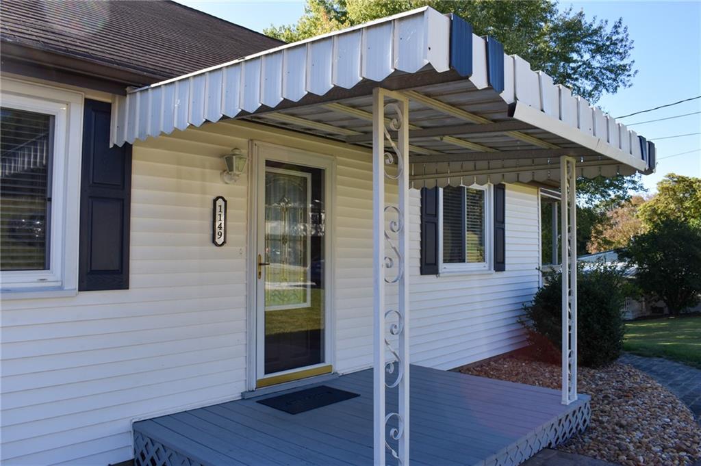 1149 Highland Avenue Vandergrift, PA 15690 - Photo 2 of 41 a view of a house with a door and wooden floor